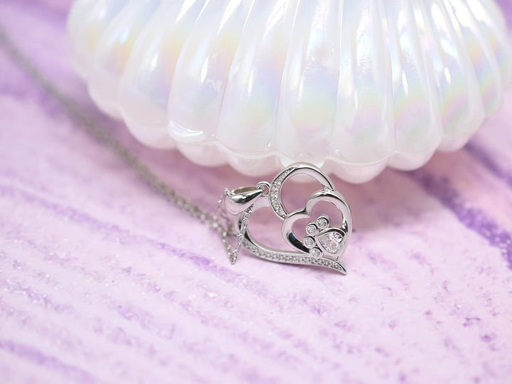 Sterlingsilberkette mit Pfotenabdruck und Herzchen, mit Zirkonia besetzt.