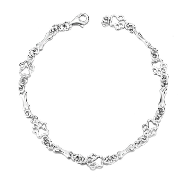 Silbernes Armband mit Hundepfoten- und Knochenanhänger
